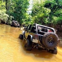 JEEP IN THE CREEK